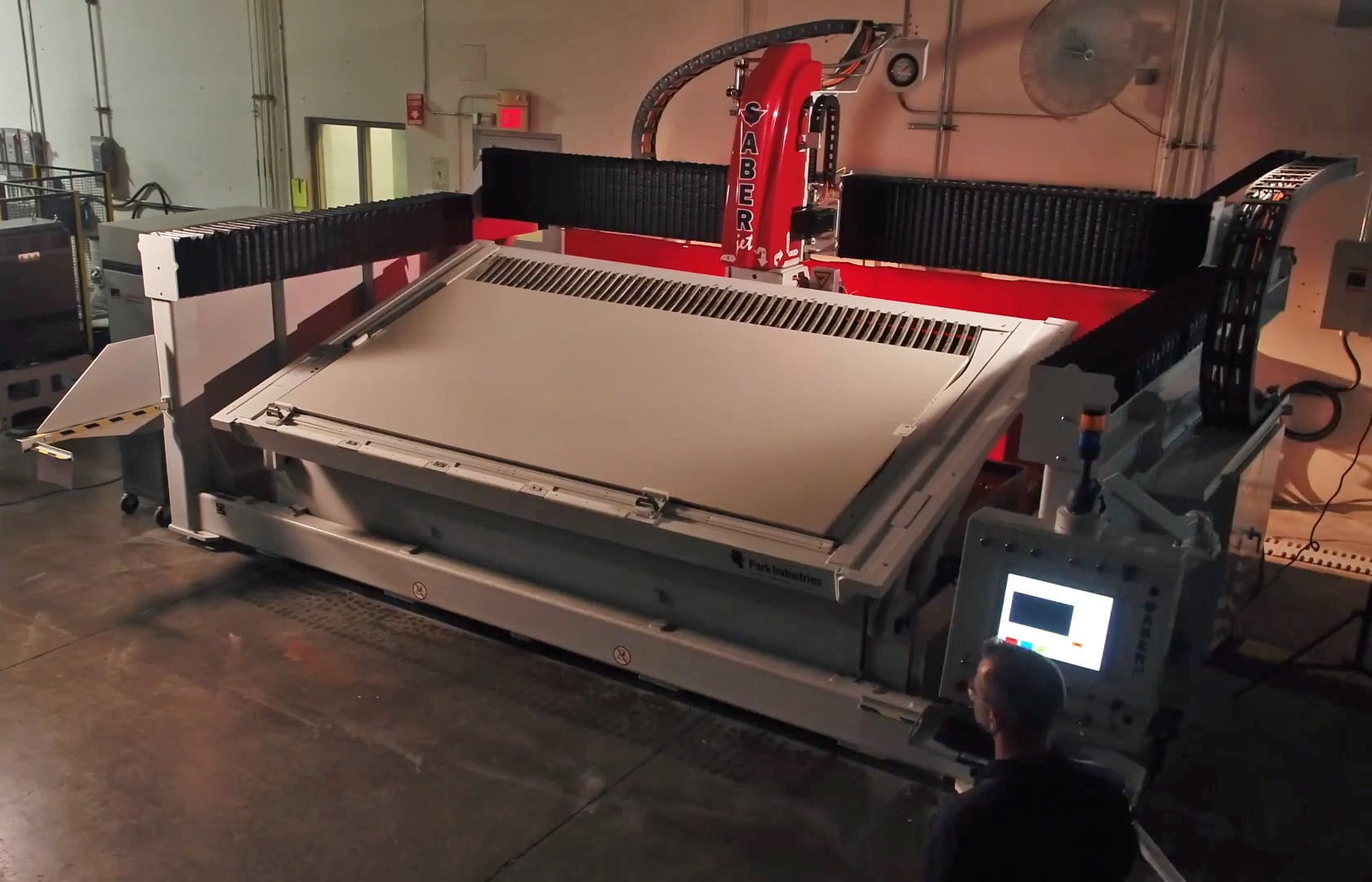 Granite Fabrication 1 SABERjet CNC sawjet with slab loading tank for stone countertop fabrication